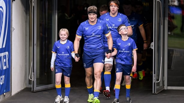 11 October 2025; Leinster Bank of Ireland matchday mascots Lucy Smyth, from Laois, and Scott Nolan, from Wexford, with Leinster captain Josh van der Flier before the United Rugby Championship match between Leinster and Hollywoodbets Sharks at the Aviva Stadium in Dublin. Photo by Brendan Moran/Sport