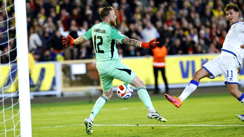 Kosovo's Fisnik Asllani beats Viktor Johansson in the Sweden goal