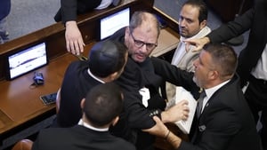 Israeli politician kicked out for protesting during Trump's Knesset speech show image