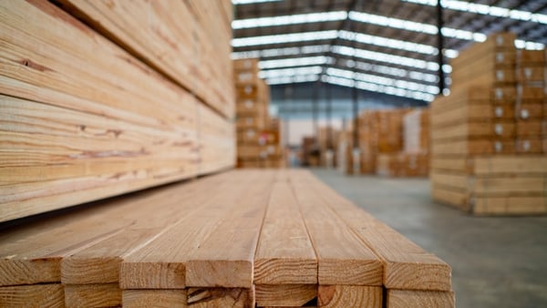 Stacks of wood and lumber in a big warehouse
