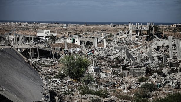 Destroyed buildings and rubble are seen as displaced Palestinians return to the al-Zahra area in central Gaza City