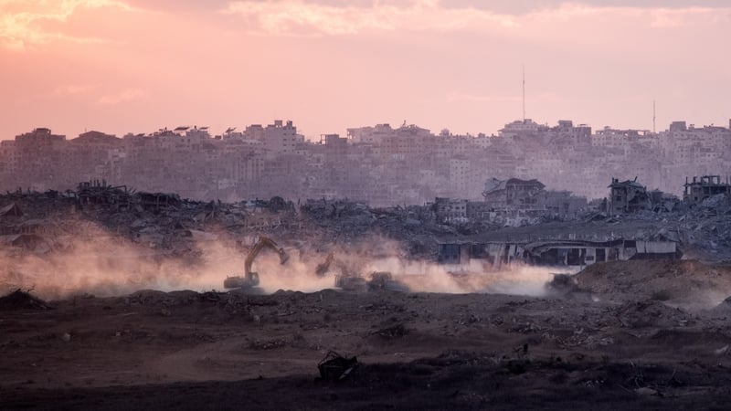 Israeli tanks and military vehicles deployed along the border in Sderot