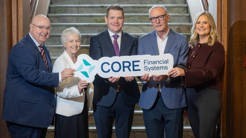 Karl O'Leary, CEO of Core Financial Systems; Anne Lanigan, from Enterprise Ireland; Jim Bradley, CTO of Core Financial Systems; Minister Peter Burke; Jane Colgan, CFO of Core Financial Systems and Michael Browne, from Enterprise Ireland
