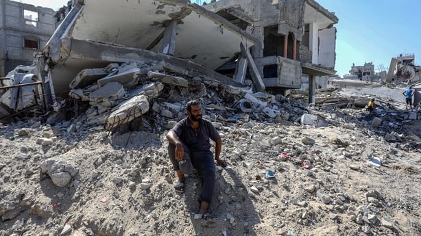 KHAN YUNIS, GAZA - OCTOBER 14: Destroyed buildings and rubble are seen as displaced Palestinians return to the Akkad region in Khan Yunis, Gaza following the withdrawal of Israeli forces on October 14, 2025. After the ceasefire takes effect, civilians discover widespread destruction, with entire res