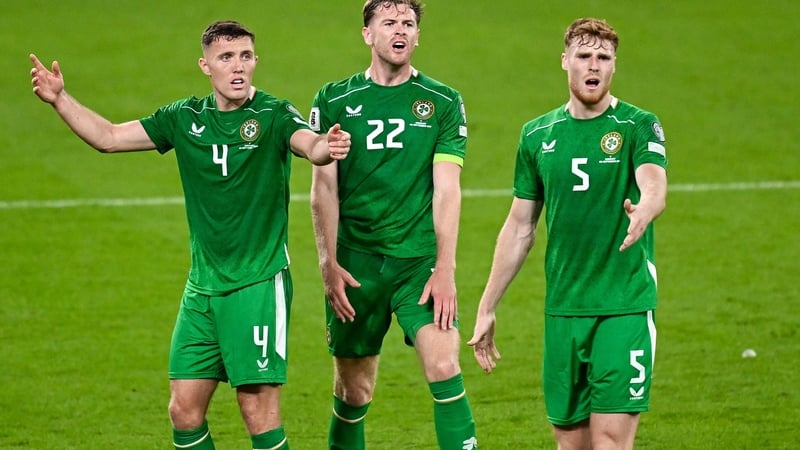 Dara O'Shea (L), Nathan Collins and Jake O'Brien (R) were at the centre of a five-man defence against Armenia