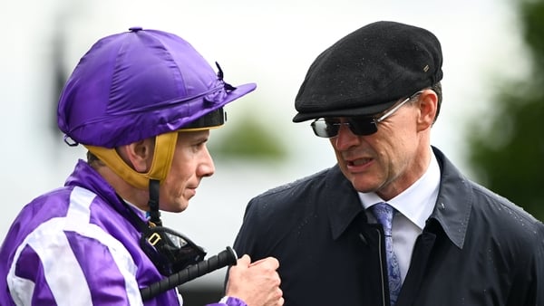 20 July 2025; Trainer Aidan O'Brien with Ryan Moore after winning the Romanised Minstrel Stakes with Diego Velazquez during day two of the Juddmonte Irish Oaks Weekend at The Curragh Racecourse in Kildare. Photo by Matt Browne/Sportsfile