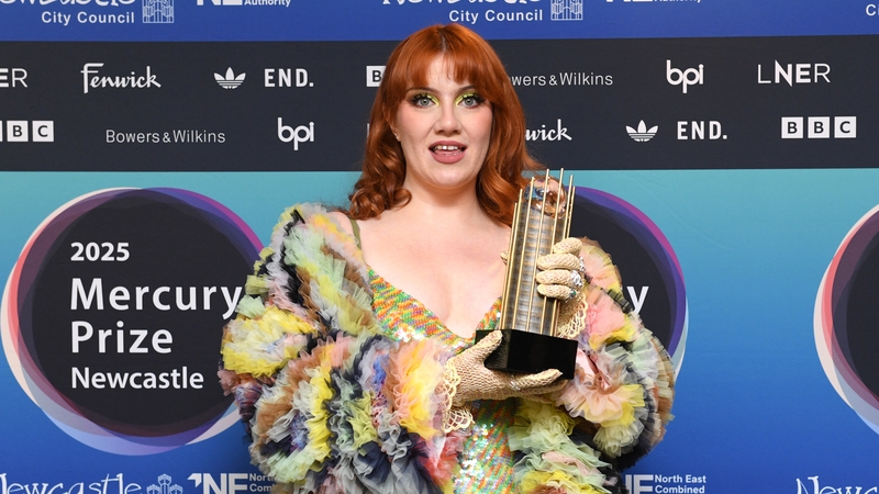 CMAT pictured at the Mercury Prize ceremony on Thursday, 16 October, holding her shortlist award