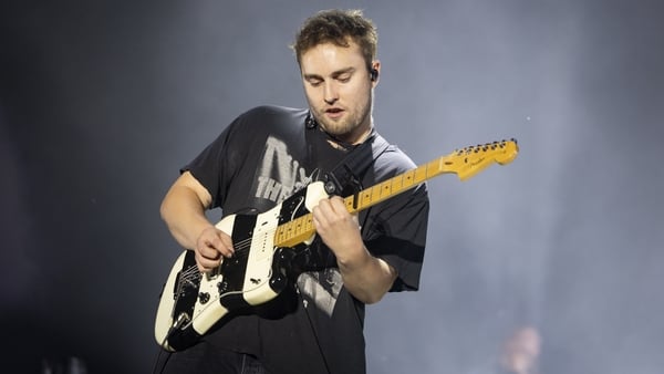 Sam Fender performing onstage