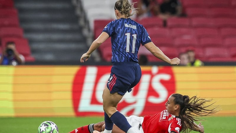 Benfica's Catarina Amado slides in for a challenge on Arsenal's Katie McCabe