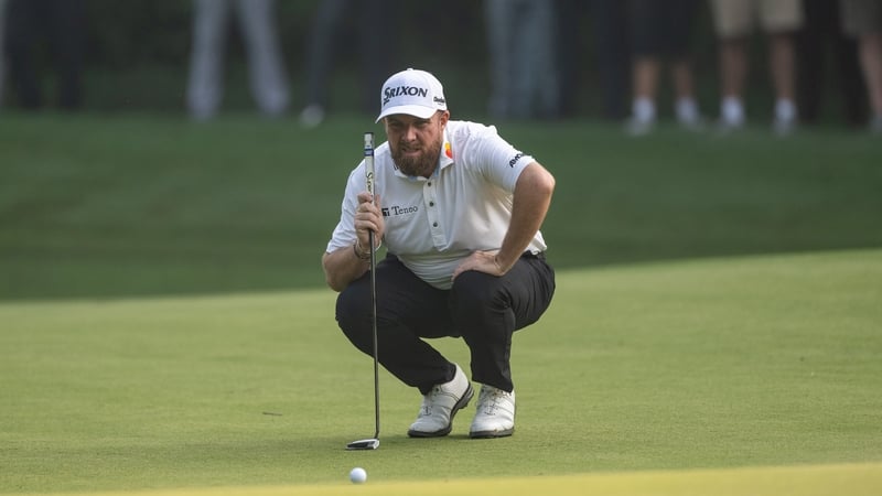 Shane Lowry lines up his putt on hole 11 on day two of the DP World India Championship