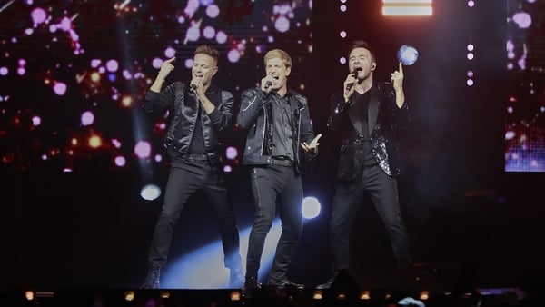 Nicky Byrne, Shane Filan and Kian Egan of Westlife performing onstage