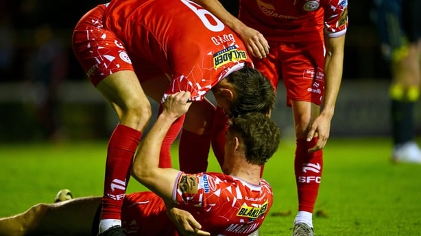 John Martin of Shelbourne, bottom, celebrates with teammate Sean Boyd after scoring against Sligo Rovers, Premier Division, October 2025