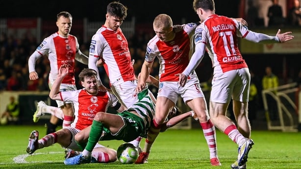 Danny Mandroiu of Shamrock Rovers in action against St Patrick's Athletic players, from left, Jamie Lennon, Barry Baggley, Darren Robinson, Tom Grivosti and Jay McClelland, 11, during the SSE Airtricity Men's Premier Division match between St Patrick's Athletic and Shamrock Rovers at Richmond Park i