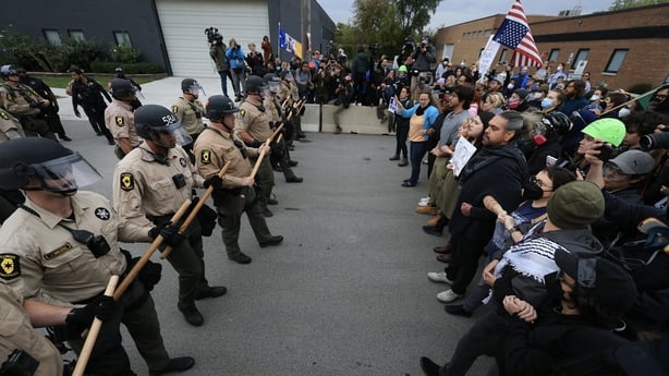 BROADVIEW, ILLINOIS - OCTOBER 17: Police interact with demonstrators near the "Free Speech Zone" outside of the immigrant processing and detention center on October 17, 2025, in Broadview, Illinois. Demonstrations have been taking place outside of the facility for several weeks as the Trump administ