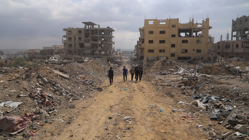 Displaced Palestinians, returning to Al-Gabari neighbourhood today, face scenes of devastation in Gaza City