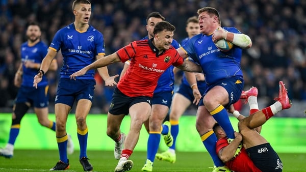 18 October 2025; Tadhg Furlong of Leinster is tackled by Tom Farrell, right, and Shane Daly of Munster during the United Rugby Championship match between Leinster and Munster at Croke Park in Dublin. Photo by Brendan Moran/Sportsfile