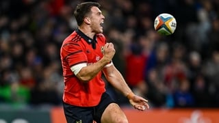 18 October 2025; Tom Farrell of Munster celebrates after scoring his side's second try during the United Rugby Championship match between Leinster and Munster at Croke Park in Dublin. Photo by Seb Daly/Sportsfile
