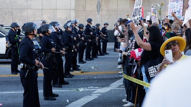 LOS ANGELES, CALIFORNIA - OCTOBER 18: Protesters begin to face off with police outside the Metropolitan Detention Center as part of the "No Kings" protest on October 18, 2025 in Los Angeles, California. Organizers expect millions to participate in cities and towns across the nation for the second "N
