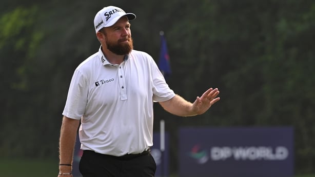 NEW DELHI, INDIA - OCTOBER 19: Shane Lowry of Ireland acknowledges the gallery after holing out on the 18th green on day four of the DP World India Championship 2025 at Delhi Golf Club on October 19, 2025 in New Delhi, India. (Photo by Prakash Singh/Getty Images)