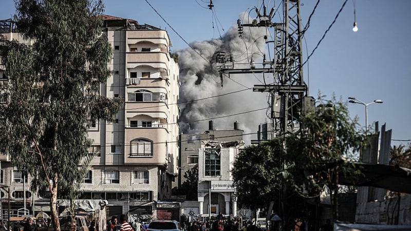 Smoke rises after an Israeli airstrike hit al-Bureij camp despite ceasefire in Gaza
