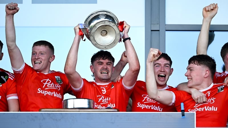 Athy with their hands on the trophy