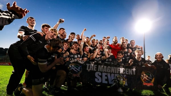 19 October 2025; Kilcoo players celebrate after their side's victory in the Down County Senior Club Football Championship final match between Carryduff and Kilcoo at Páirc Esler in Newry, Down. Photo by Thomas Flinkow/Sportsfile