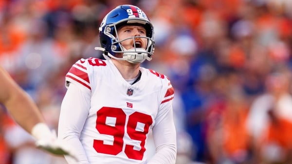 DENVER, CO - OCTOBER 19: Jude McAtamney #99 of the New York Giant reacts as he misses an extra point late in the fourth quarter against the Denver Broncos at Empower Field at Mile High on October 19, 2025 in Denver, Colorado. (Photo by Justin Edmonds/Gett