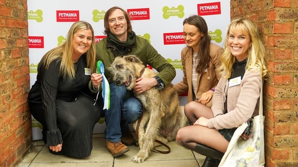 Kevin, a 4 month old Irish Wolfhound and his owners
