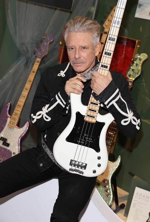 U2 bassist pictured at exhibition