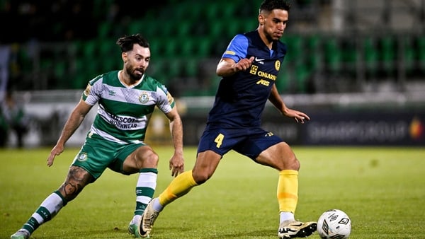 Marco Dulca of Celje and Richie Towell of Shamrock Rovers during the UEFA Europa League third qualifying round second leg match between Shamrock Rovers and Celje at Tallaght Stadium in Dublin.