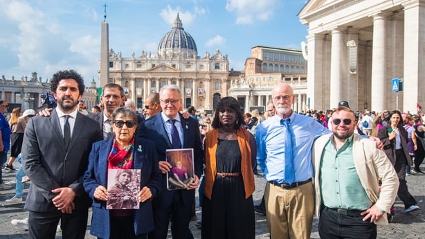 ECA Global's board members and survivors pose for a picture in St Peter's square after meeting with Pope Leo XIV