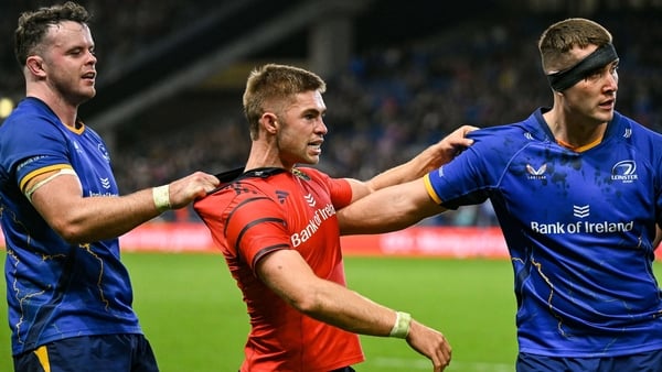18 October 2025; Jack Crowley of Munster with James Ryan, left, and Brian Deeny of Leinster during the United Rugby Championship match between Leinster and Munster at Croke Park in Dublin. Photo by Brendan Moran/Sportsfile