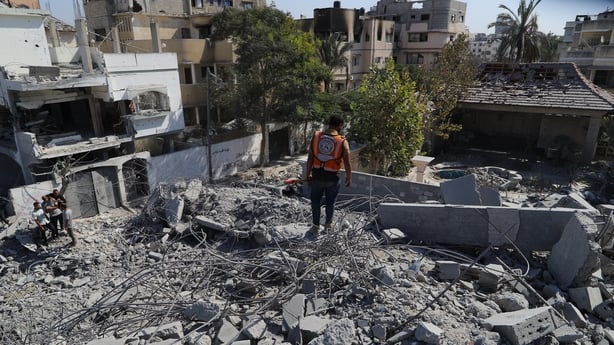 GAZA - OCTOBER 20: Civil defense teams conduct search and recovery operations to retrieve the bodies of Palestinians from the rubble of buildings destroyed by Israeli attacks, facing major difficulties due to Israel's ban on the entry of heavy machinery and rescue equipment since the beginning of th