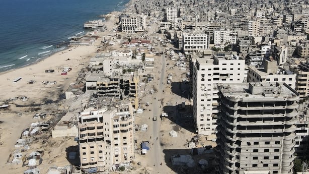 Damaged buildings next to the sea
