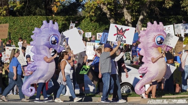 THOUSAND OAKS, CA - OCTOBER 18: Demonstrators participate in the second "No Kings" protest on October 18, 2025 in Thousand Oaks, California. Organizers expect millions to participate in cities and towns across the nation for the second "No Kings" protest to denounce the Trump administration. (Photo