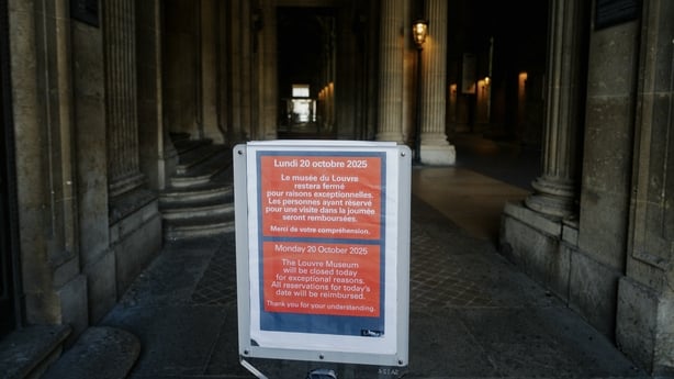 A sign in a courtyard
