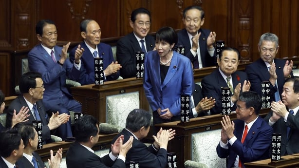 Sanae Takaichi receives a round of applause during an extraordinary session at the lower house of parliament in Tokyo, Japan