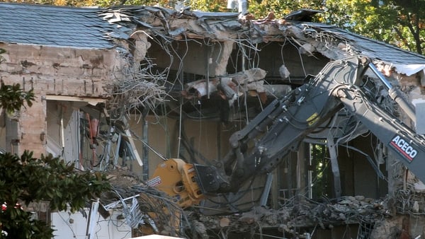 Demolition of the facade of the East Wing of the White House is shown as works are under way to build a ballroom