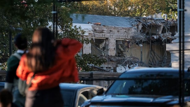 Demolition of the facade of the East Wing of the White House is shown as works are under way to build a ballroom 
