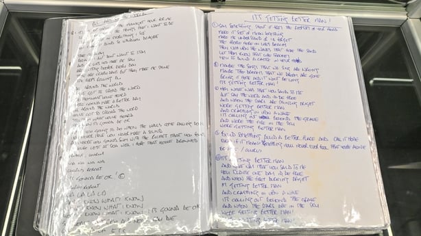 A folder containing the complete collection of Noel Gallagher handwritten lyrics for every song on all seven Oasis studio albums is seen during the Propstore music memorabilia auction photocall at The Cumberland Hotel on 20 October, 2025 in London