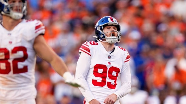 DENVER, CO - OCTOBER 19: Jude McAtamney #99 of the New York Giant reacts as he misses an extra point late in the fourth quarter against the Denver Broncos at Empower Field at Mile High on October 19, 2025 in Denver, Colorado. (Photo by Justin Edmonds/Getty Images)