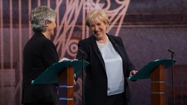 Catherine Connolly and Heather Humphreys shake hands