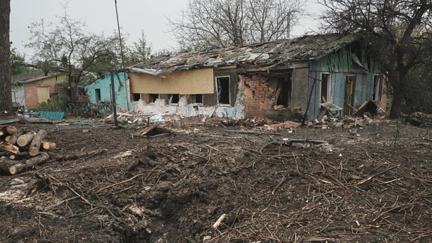 KHARKIV, UKRAINE - OCTOBER 21: Hole left near destroyed house at residential district after Russian attack with aerial bombs on October 21, 2025 in Kharkiv, Ukraine. Explosions occurred in the Industrialnyi and Nemyshlianskyi Districts. As a result of the strike, private houses were damaged, and loc
