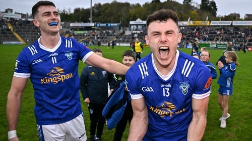 Jordan Morris (r) and team-mate Peter Corrigan celebrate after winning the 2025 Cavan SFC title