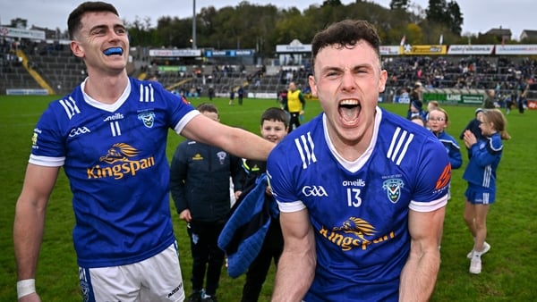 Jordan Morris of Kingscourt Stars, right, and teammate Peter Corrigan celebrate after winning 2025 Cavan SFC title