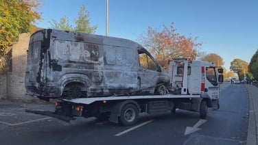 Burnt out Garda vehicle is towed away