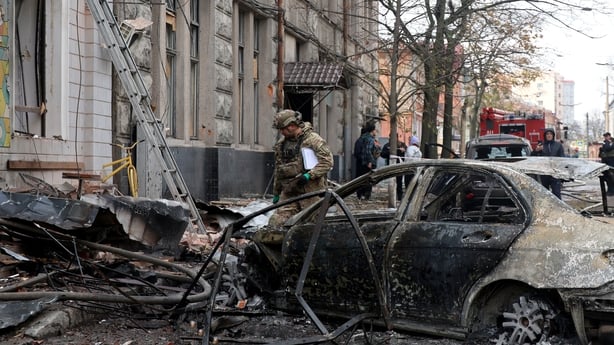 A forensic expert examines the premises of a private kindergarten in the Kholodnohirskyi district hit by three Russian Shahed drones in Kharkiv, Ukraine, on October 22, 2025. At around 11:00 am local time on Wednesday, October 22, Russian troops attack the Kholodnohirskyi district of Kharkiv with th