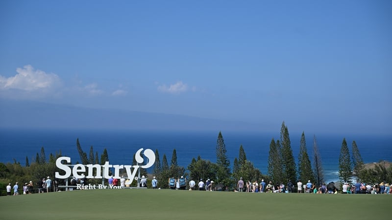 Fans walk along the course during the final round of The Sentry at The Plantation Course at Kapalua this January