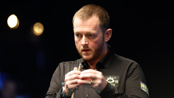 Mark Allen of Northern Ireland chalks the cue in the Final match against Zhou Yuelong of China on day 11 of 2025 BetVictor English Open at the Brentwood Leisure Centre on September 21, 2025 in Brentwood, England.