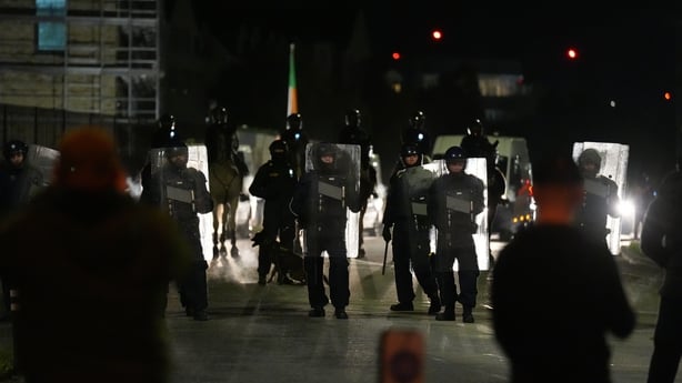gardai with riot shields